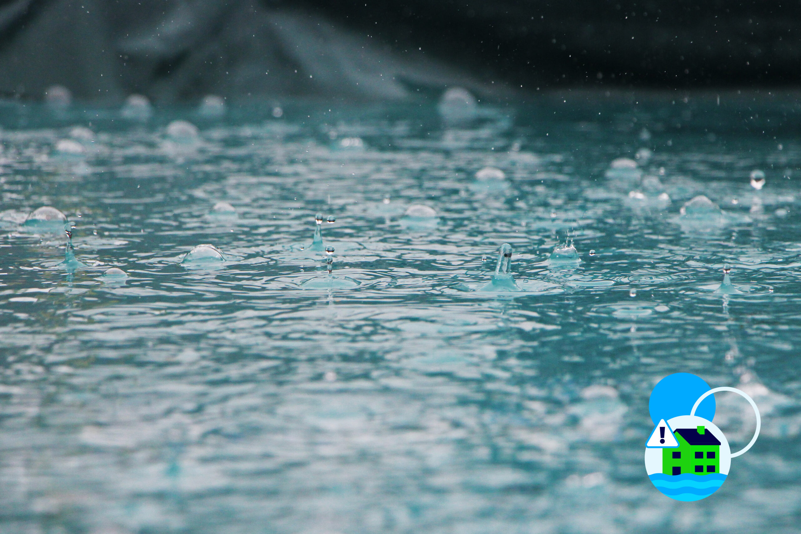 Large rain drops falling. This image includes Eye on Calderdale branding.