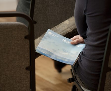 Consultation leaflet carried in someone's hand