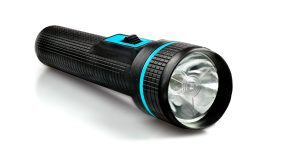 Black flashlight isolated on white background