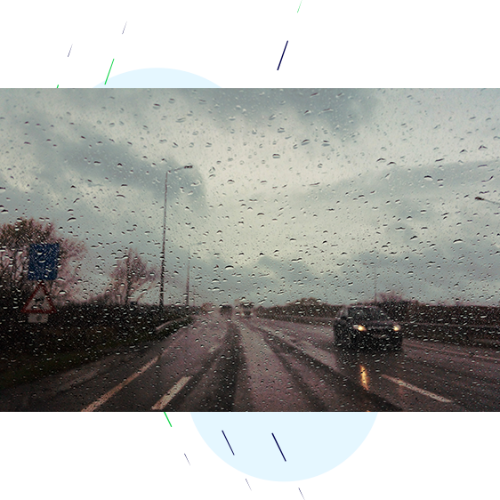 Driving in heavy rainfall.