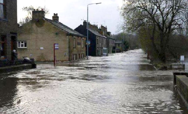 Flooding on Park Road, Elland. All the properties on the street are flooded including the local pub and highway.