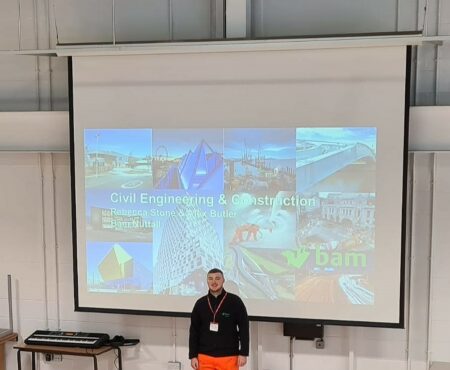 Trainee Engineer, Alex, delivering an assembly to 200 Year 7 Students at Trinity Academy Grammar in Sowerby Bridge.