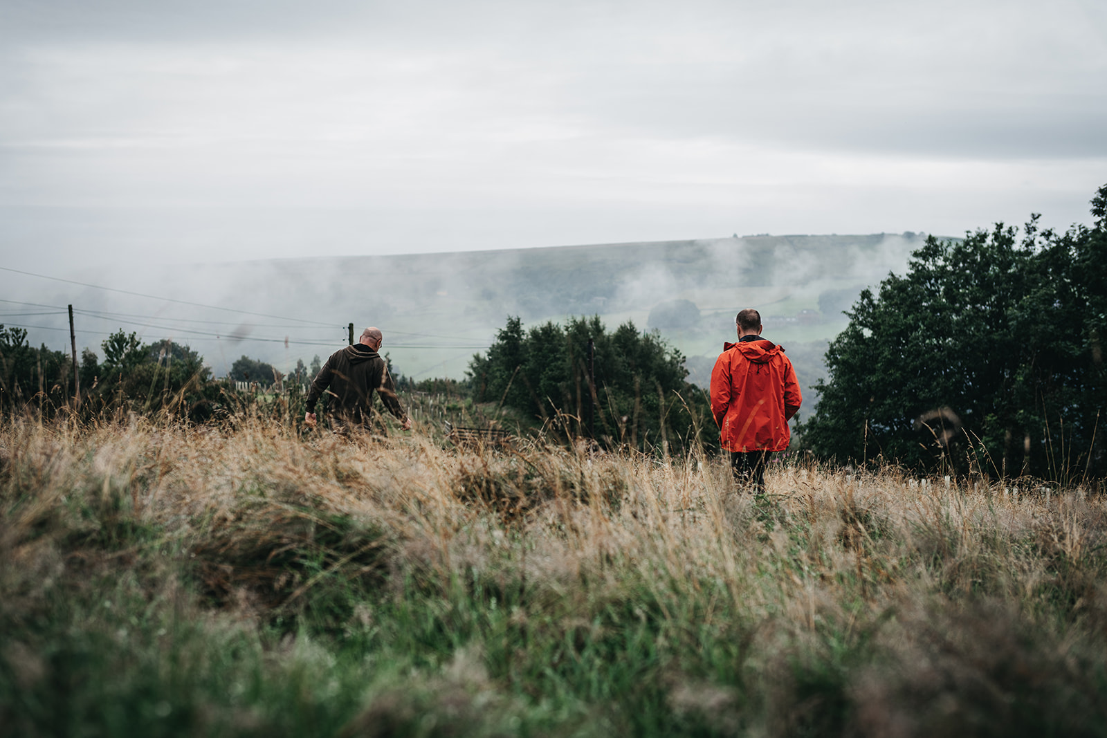 Natural flood management officer walks with landowner to seek out natural flood management opportunities.
