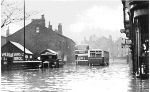 Buses in the 1940s in Calderdale stuck in flood water.