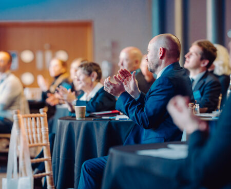 Delegates applauding at the West Yorkshire Flood Summit.